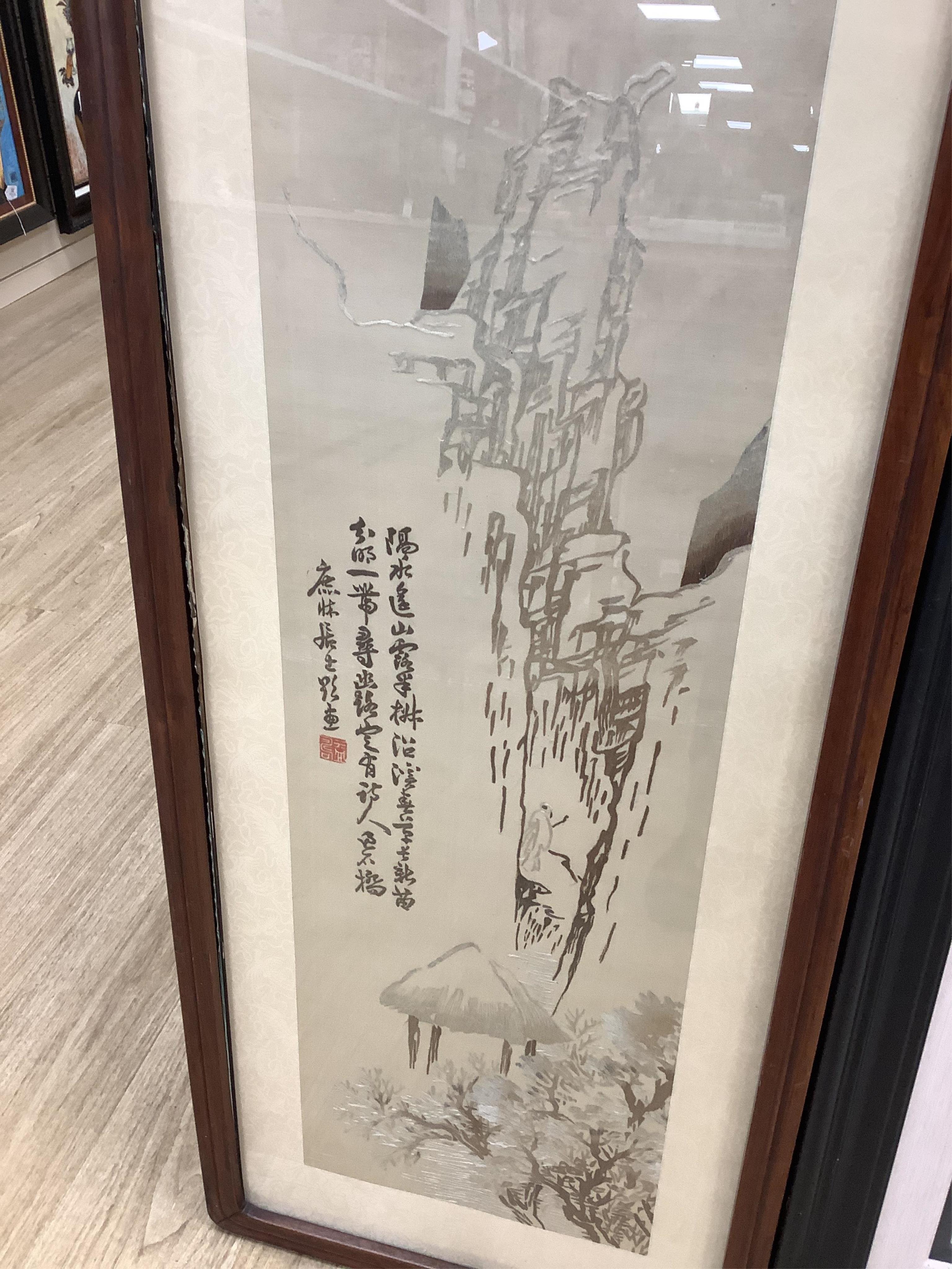 Seven Chinese embroideries on silk, mountainous landscapes and birds, largest 121cm high
